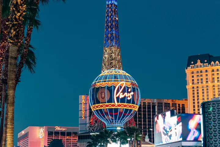 Las Vegas Boulevard at night lined with glowing casino signs
